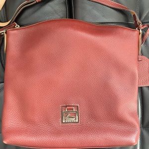 Dooney & Burke pebbled grain leather hobo in burgundy